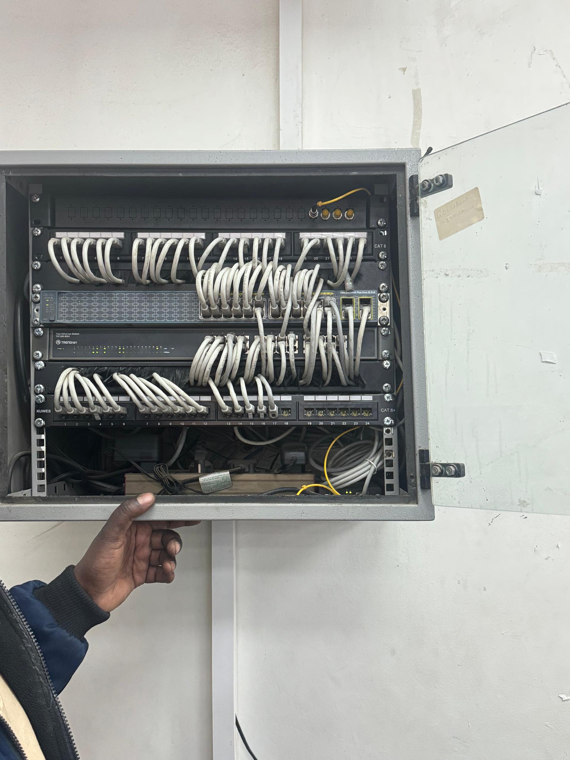 Tidied and labelled network cabinet by NITS